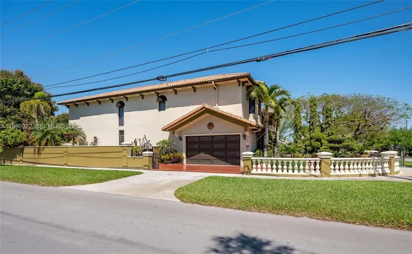 a view of a hallway with windows