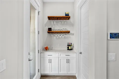 a cabinet with window and cabinets