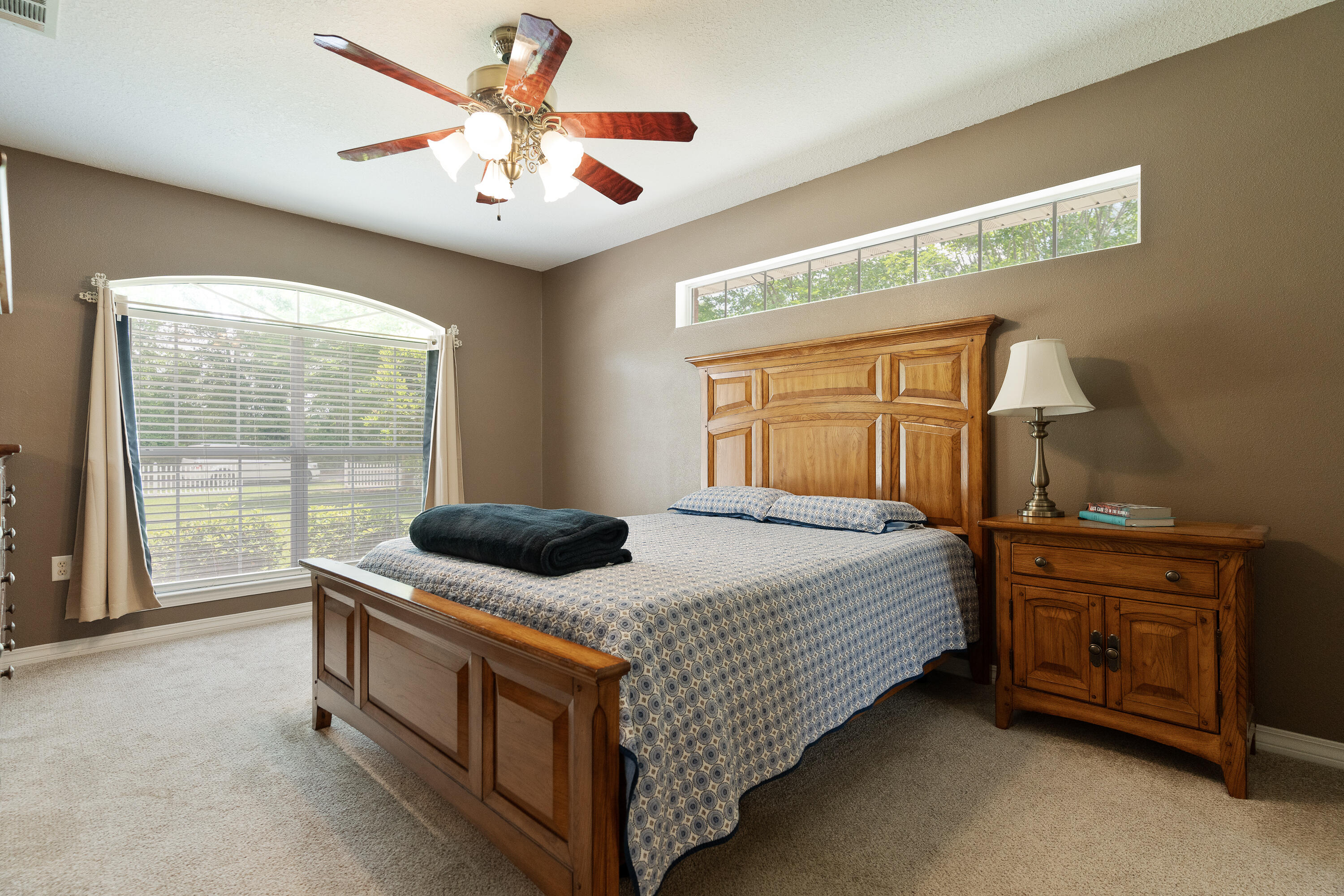 6100 Buckward Road Baker, FL 32531 - Photo 41 of 55 a bedroom with a bed and a ceiling fan