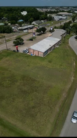 an aerial view of a house having yard