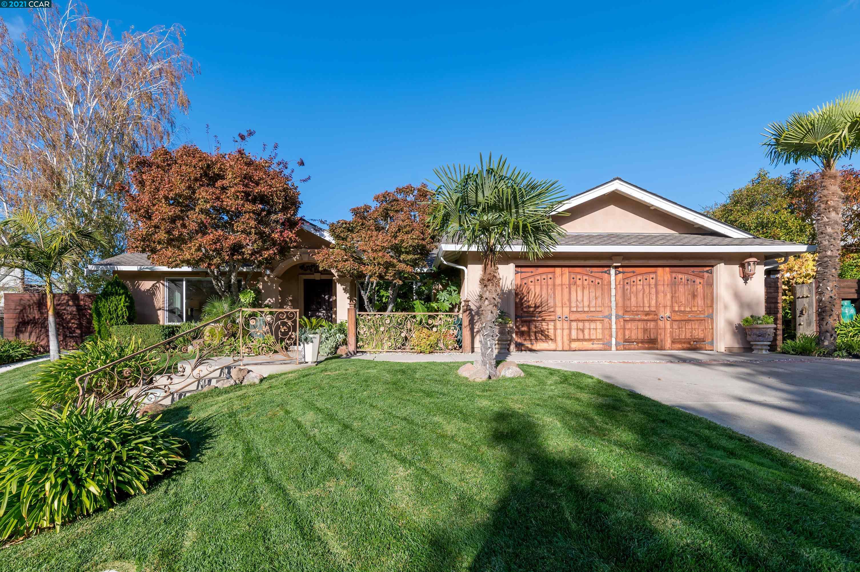 52 Seneca Lane San Ramon, CA 94583 - Photo 1 of 1 a front view of a house with a yard and porch