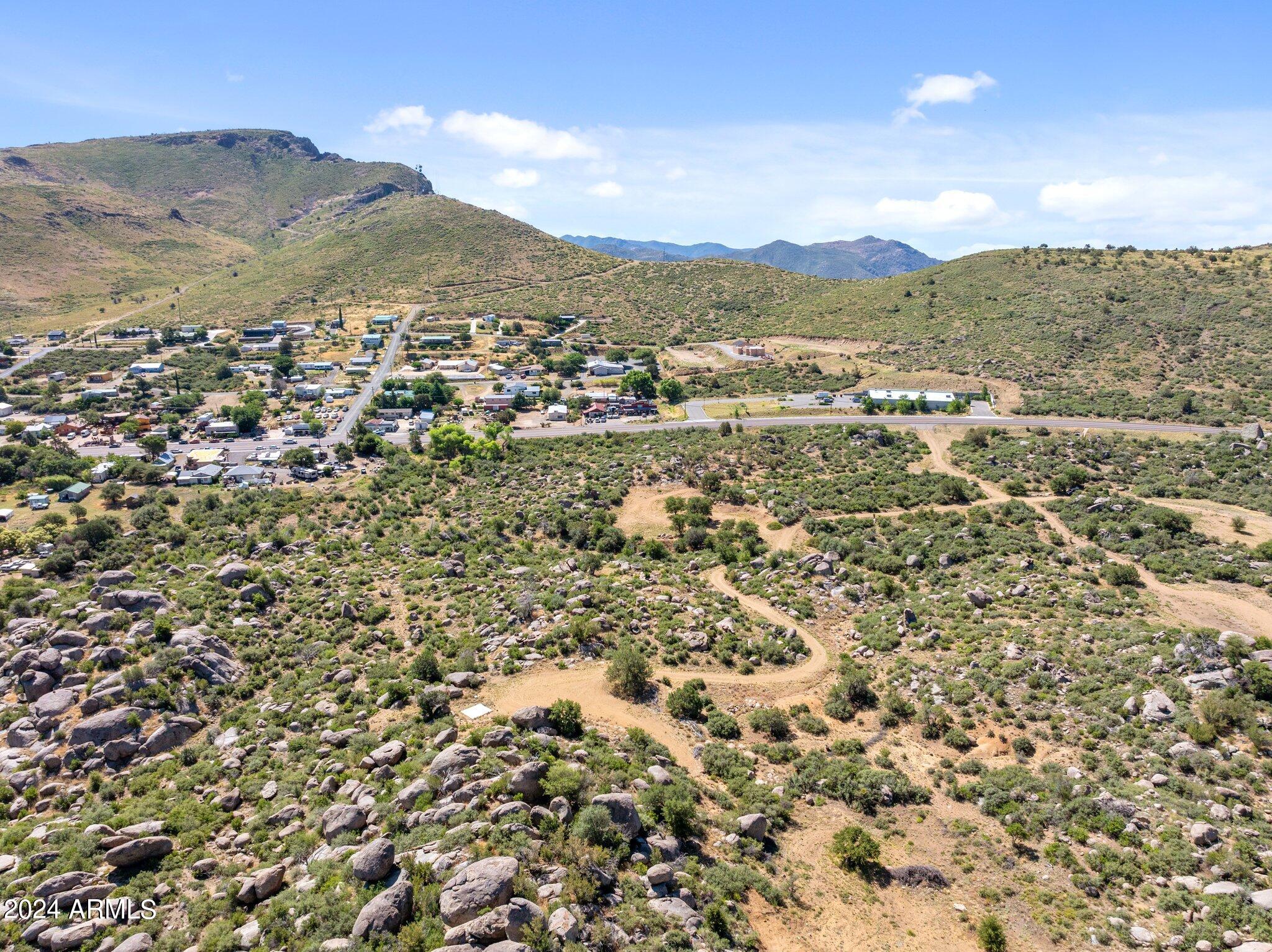 0 Pack Burro Trail, Unit 2 Yarnell, AZ 85362 - Photo 7 of 10 a view of a city with mountains in the background