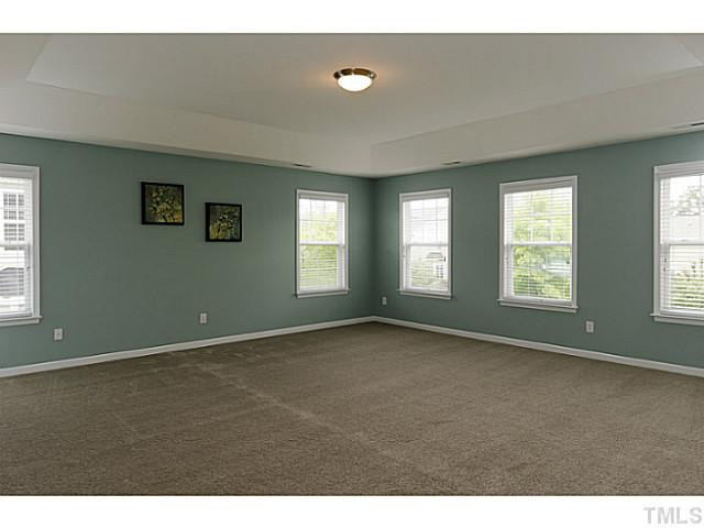 10624 Longholme Way Raleigh, NC 27614 - Photo 8 of 12 Enjoy this GORGEOUS, over-sized master suite with NEW CARPET, tray ceiling and lots of windows for plenty of light. Master Bedroom