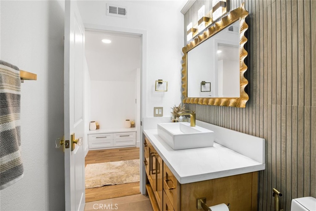 1216 Baseline Road La Verne, CA 91750 - Photo 27 of 37 a bathroom with a sink and a mirror