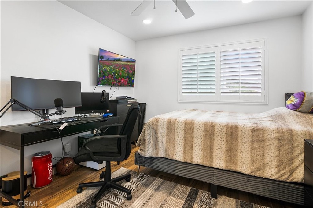 1216 Baseline Road La Verne, CA 91750 - Photo 34 of 37 a bedroom with a bed and a desk