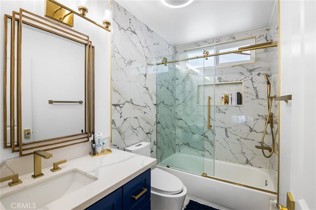 1216 Baseline Road La Verne, CA 91750 - Photo 35 of 37 a bathroom with a sink a toilet and shower