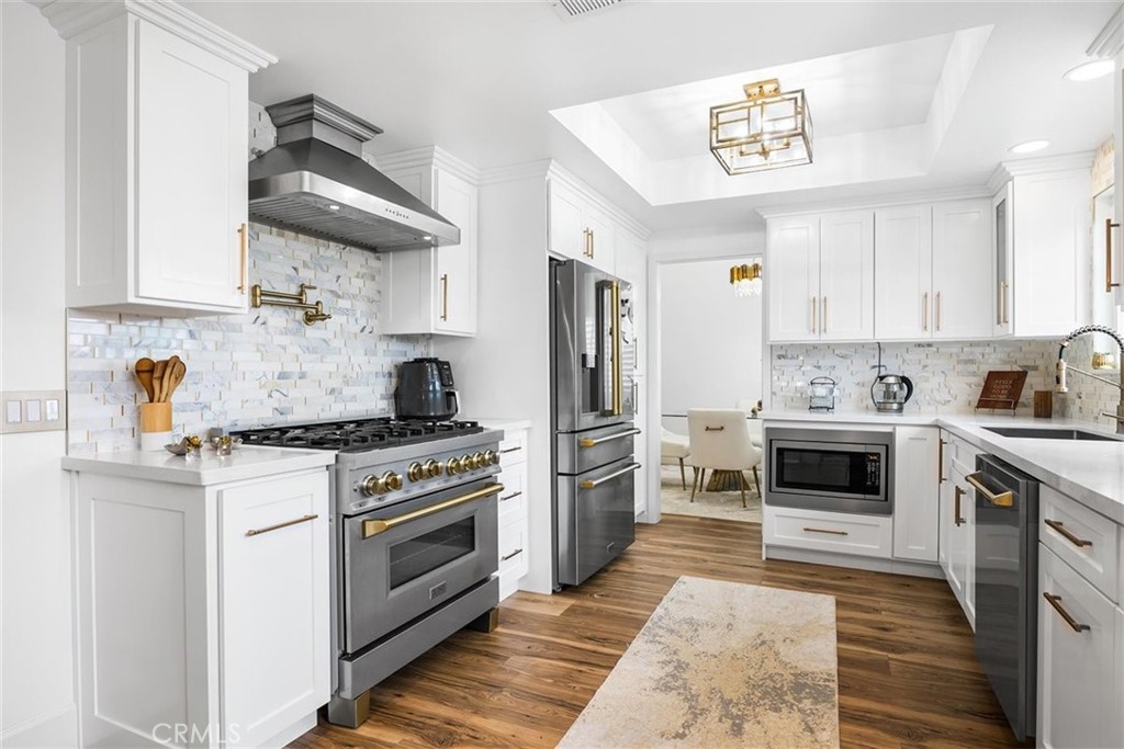1216 Baseline Road La Verne, CA 91750 - Photo 10 of 37 a kitchen with cabinets and appliances