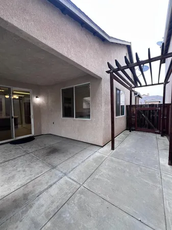 a house with yard in front of it