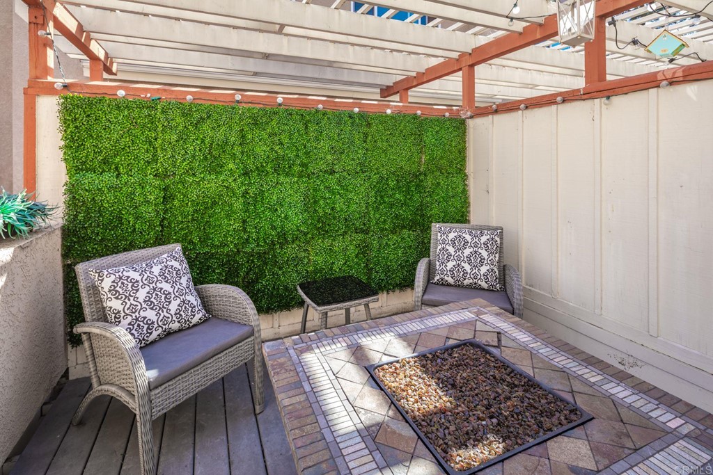 7777 Caminito Monarca, Unit 105 Carlsbad, CA 92009 - Photo 20 of 25 a outdoor living space with furniture