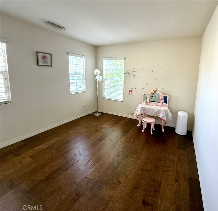 14540 Manchester Avenue Chino, CA 91710 - Photo 16 of 22 a living room with furniture and a window