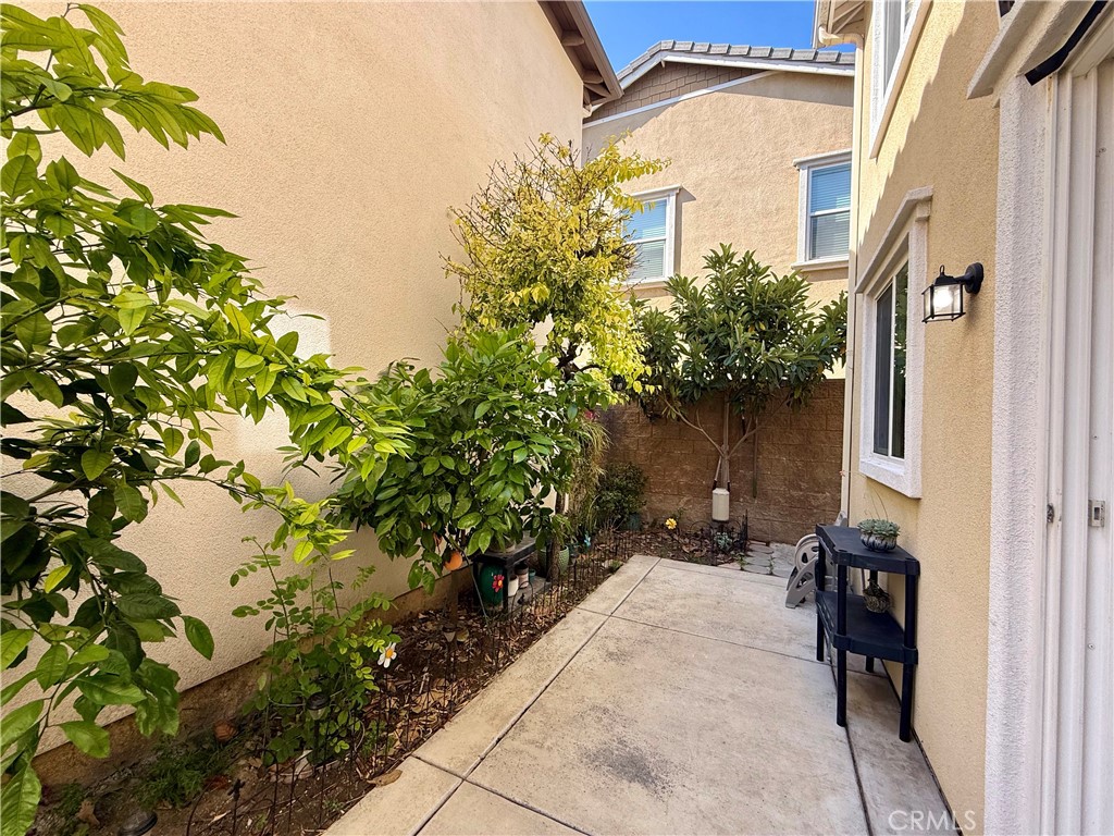 14540 Manchester Avenue Chino, CA 91710 - Photo 21 of 22 a view of a pathway along with potted plants