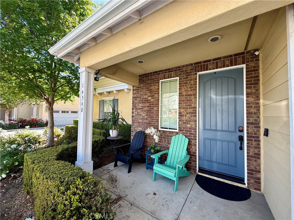 14540 Manchester Avenue Chino, CA 91710 - Photo 4 of 22 a backyard of a house with seating space
