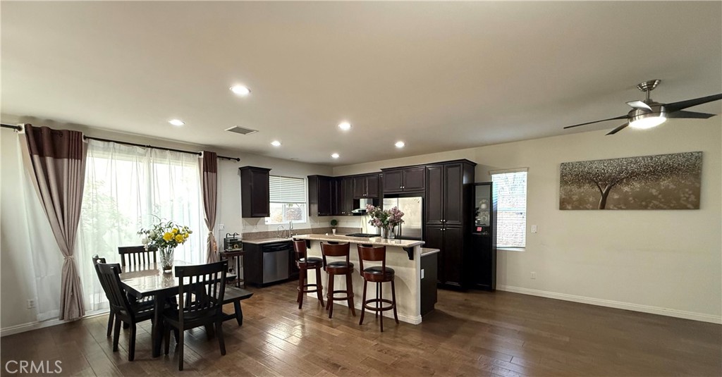 14540 Manchester Avenue Chino, CA 91710 - Photo 8 of 22 a view of a dining room with furniture and chandelier