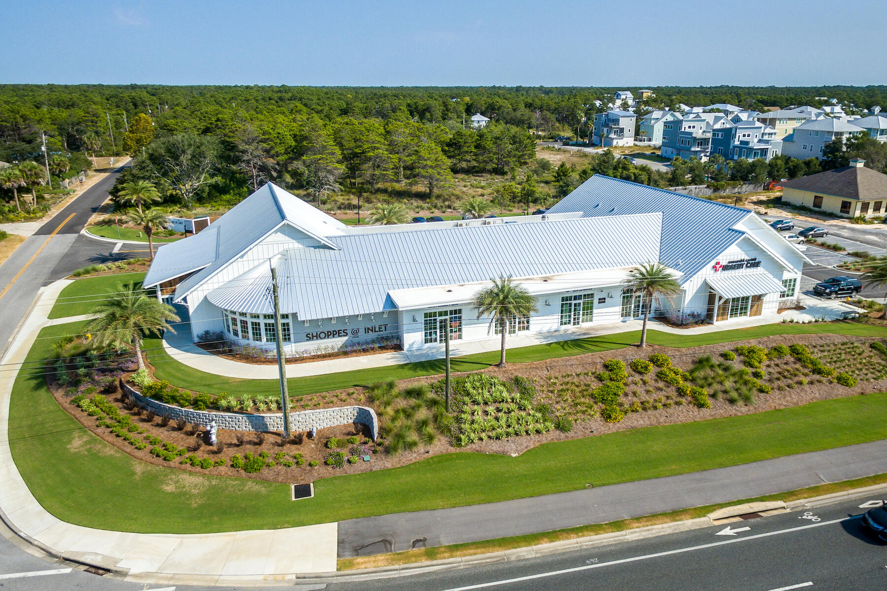 Lot 63 Grande Pointe Drive Inlet Beach, FL 32461 - Photo 21 of 21 an aerial view of a house with a garden and lake view