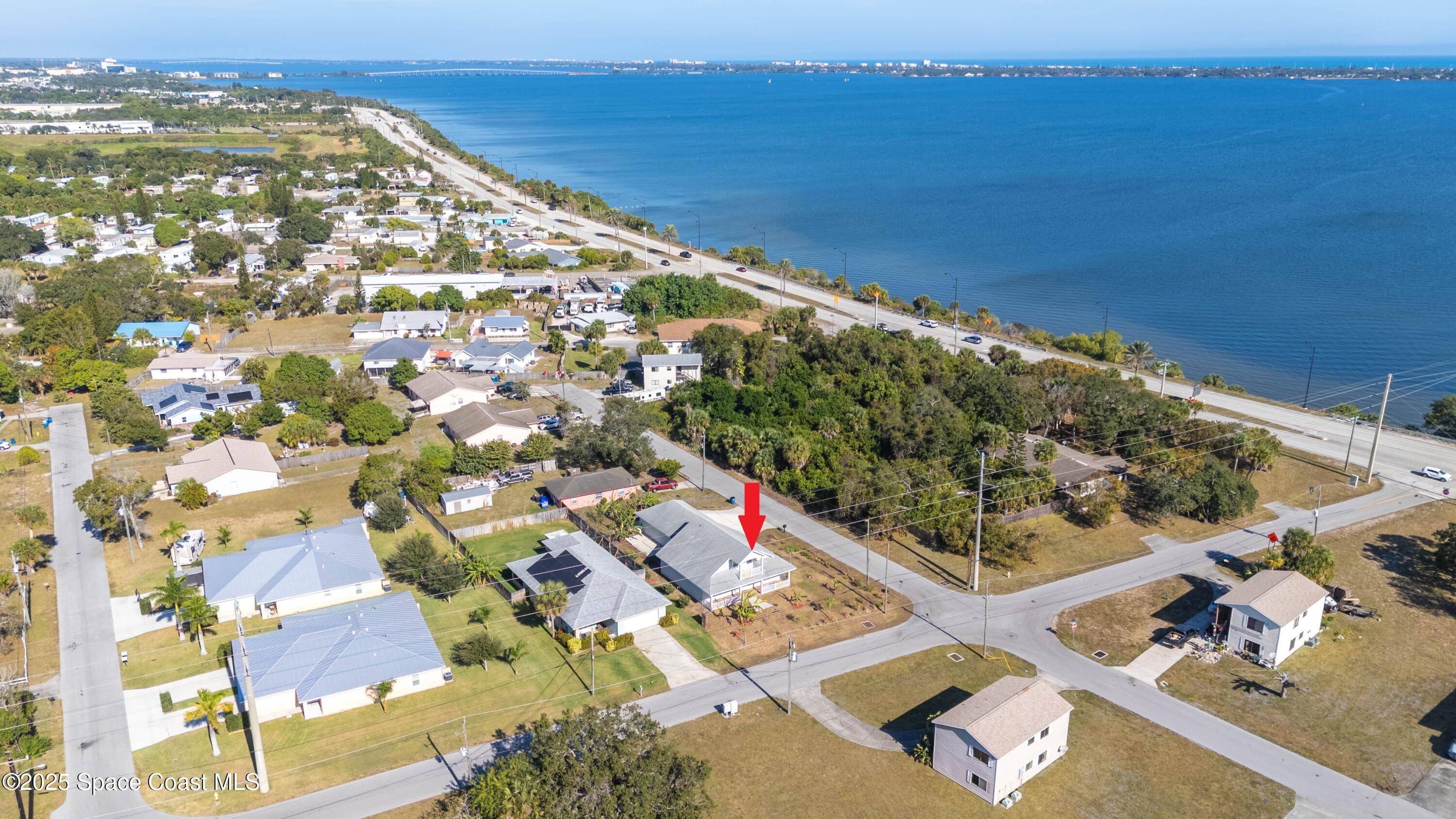 2869 Hiawatha Avenue Northeast Palm Bay, FL 32905 - Photo 2 of 49 DJI_20251206235153_0062_D_GRACE5K MARKER