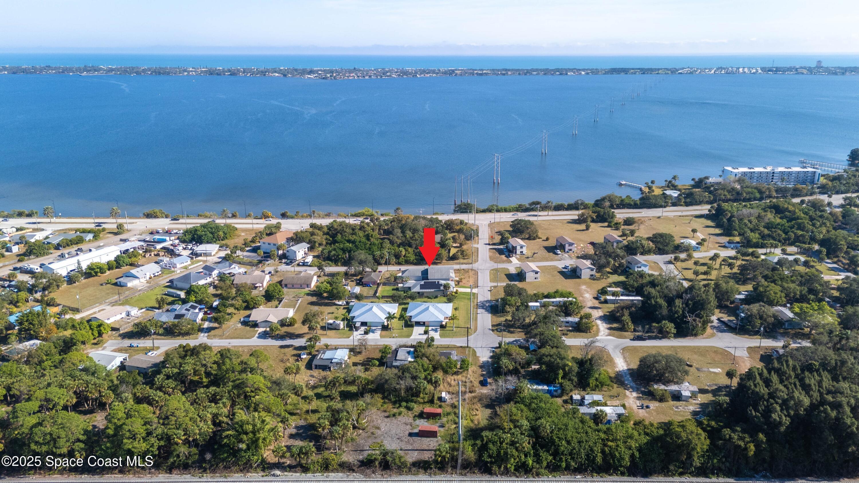 2869 Hiawatha Avenue Northeast Palm Bay, FL 32905 - Photo 3 of 49 DJI_20251206235355_0066_D_GRACE5K MARKER
