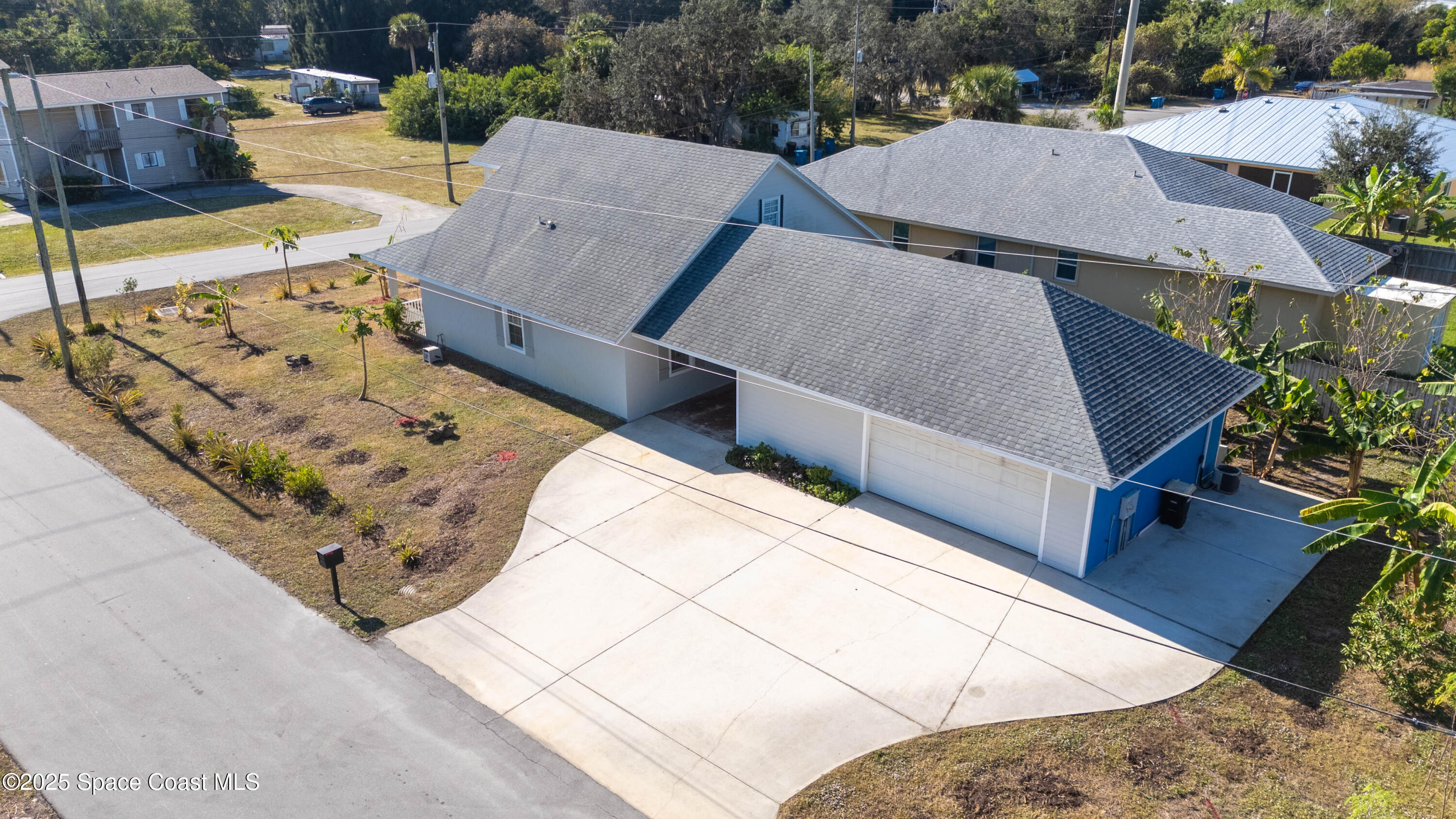 2869 Hiawatha Avenue Northeast Palm Bay, FL 32905 - Photo 34 of 49 DJI_20251206234817_0055_D_GRACE5K