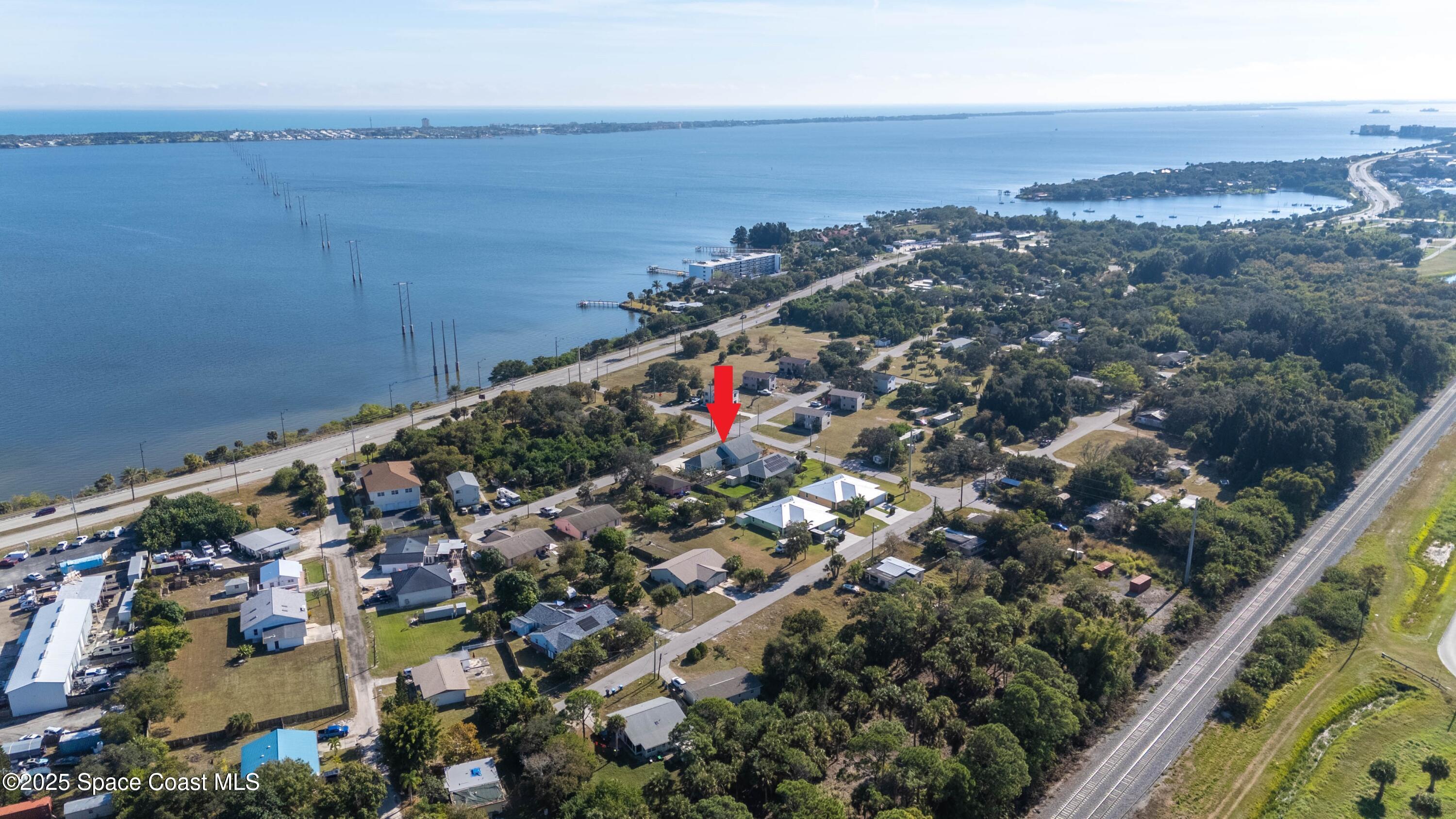 2869 Hiawatha Avenue Northeast Palm Bay, FL 32905 - Photo 43 of 49 DJI_20251206235427_0067_D_GRACE5K MARKER
