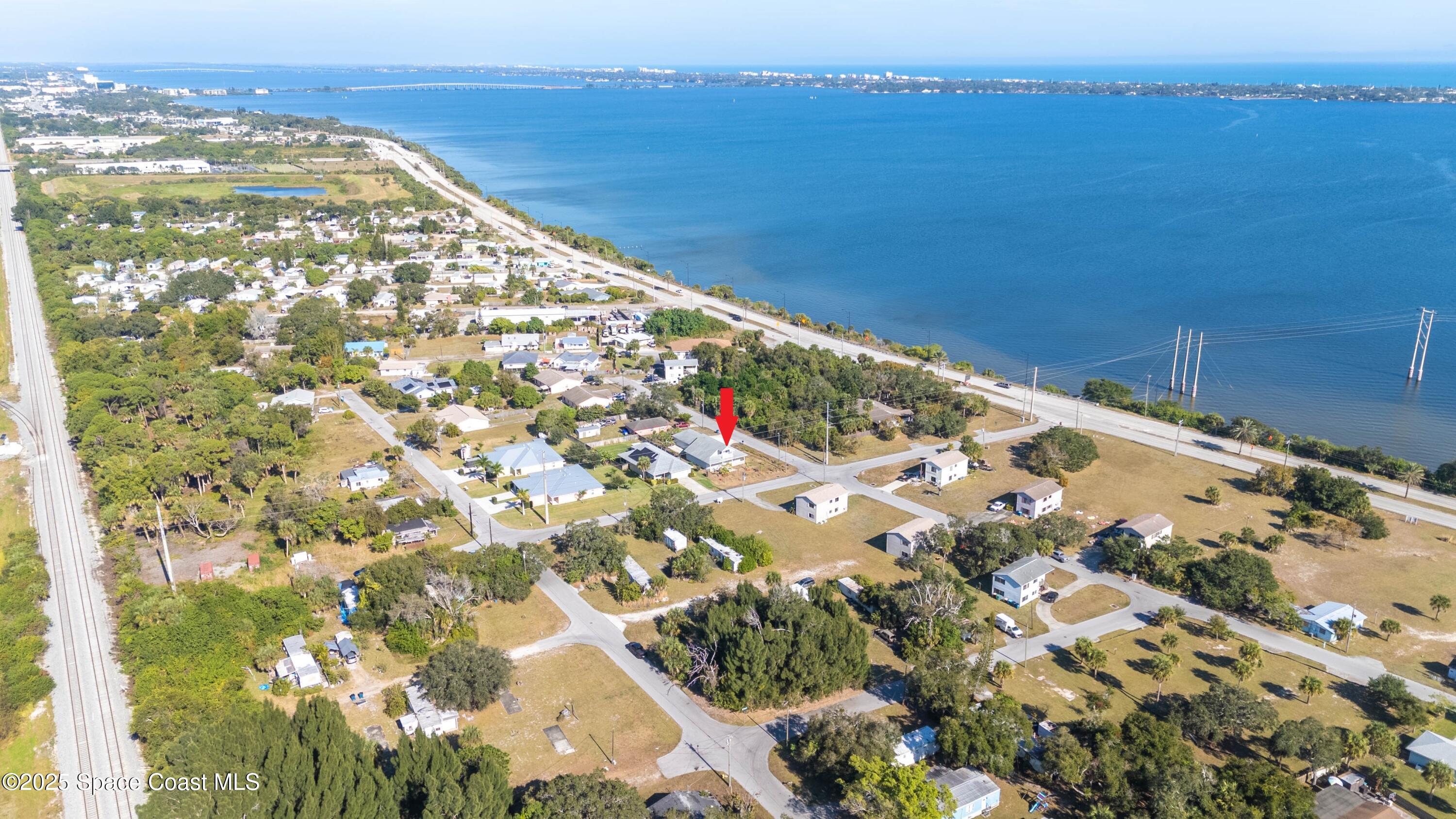 2869 Hiawatha Avenue Northeast Palm Bay, FL 32905 - Photo 44 of 49 DJI_20251206235253_0065_D_GRACE5K MARKER