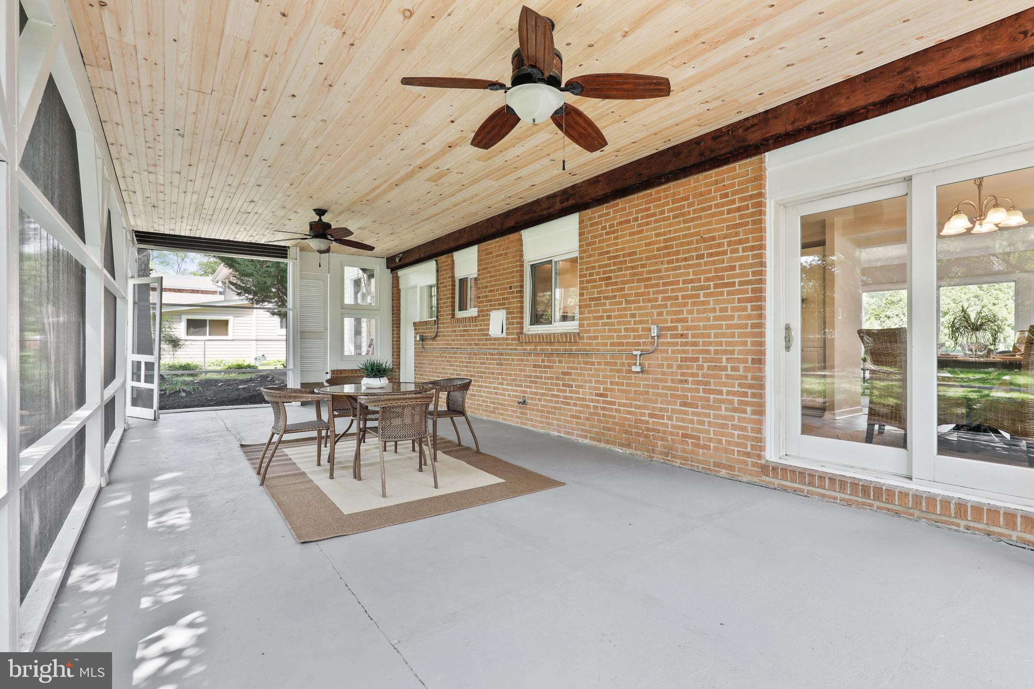203 Benfield Road Severna Park, MD 21146 - Photo 36 of 43 Screened-in porch off kitchen and dining area