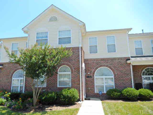 2131 Piney Brook Road, Unit 106 Raleigh, NC 27614 - Photo 1 of 23 a front view of a house with plants