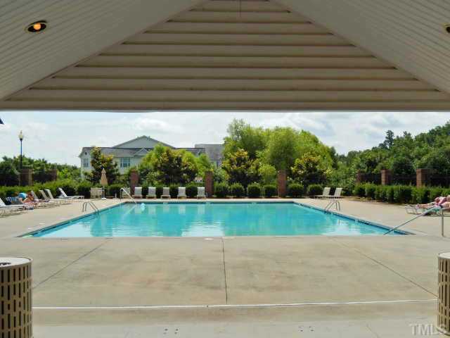 2131 Piney Brook Road, Unit 106 Raleigh, NC 27614 - Photo 17 of 23 a view of a swimming pool and a yard