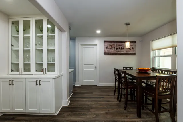 a view of a bathroom from a hallway