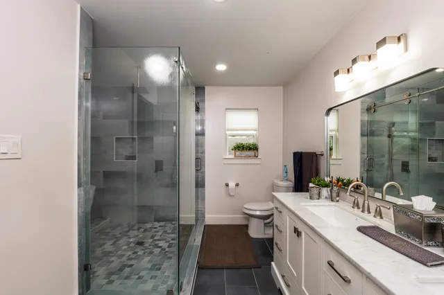 a living room with a couch and a flat screen tv