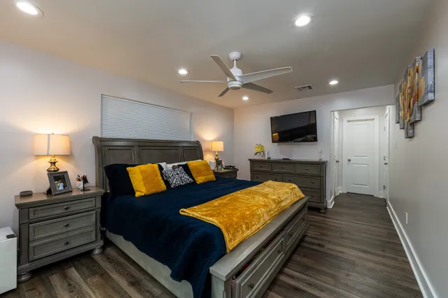 a hallway with furniture and window