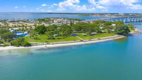 a view of a lake with a big yard