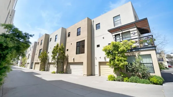a view of a building with a street