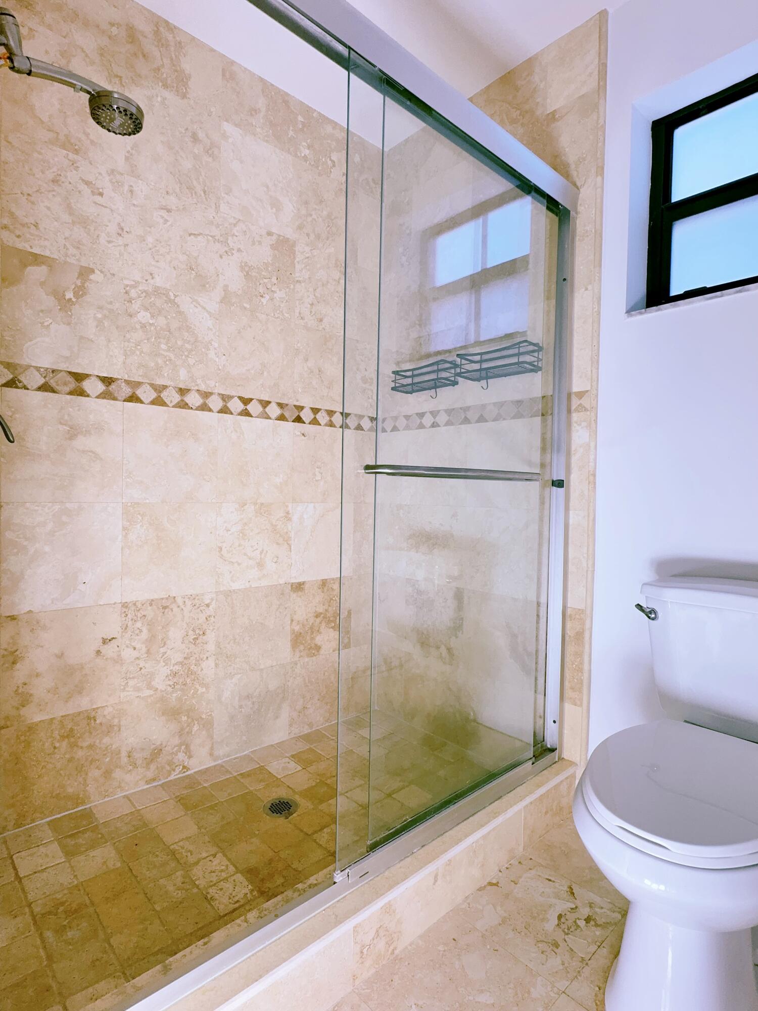 3150 Leewood Terrace, Unit L221 Boca Raton, FL 33431 - Photo 12 of 26 Master Shower