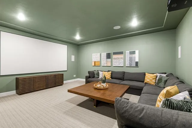 a living room with furniture rug and window
