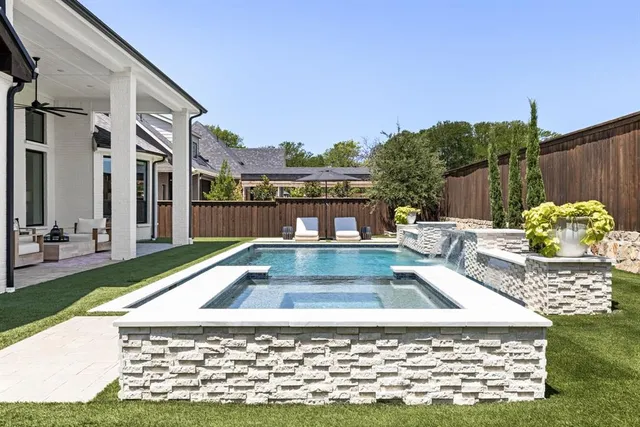 a view of a house with a yard balcony