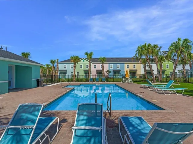 a view of a house with swimming pool