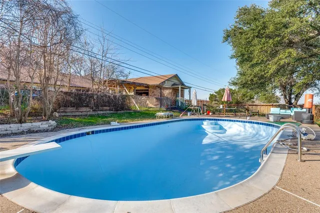 a view of outdoor space yard swimming pool and patio