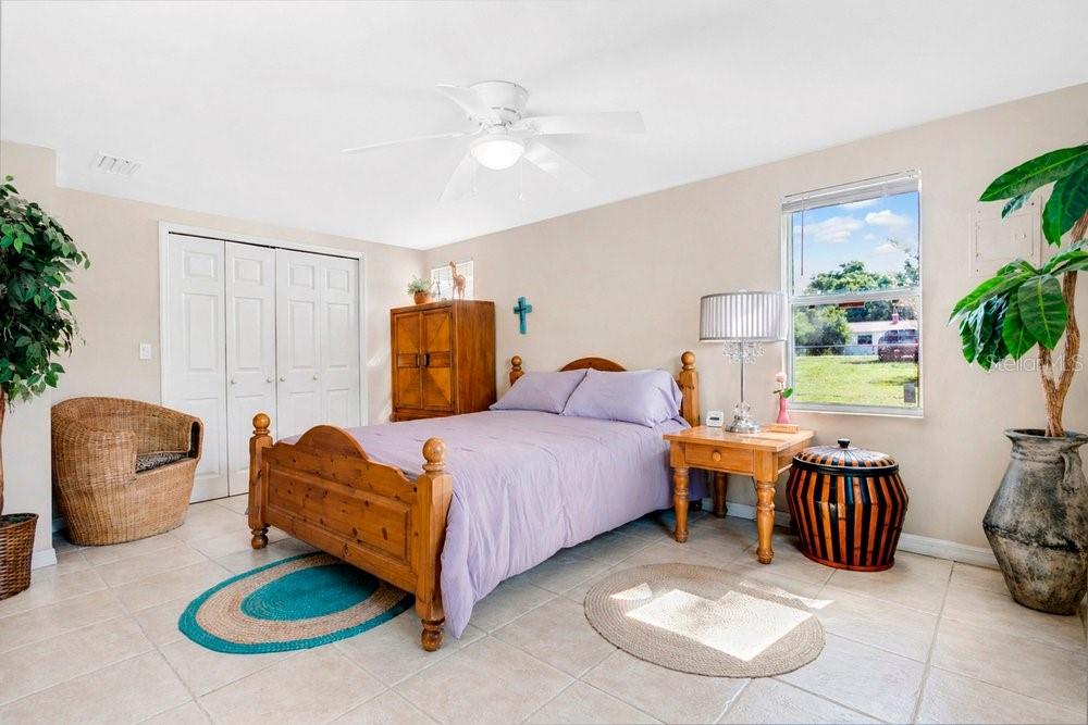 595 3rd Street Oviedo, FL 32765 - Photo 15 of 27 a bedroom with furniture and a window