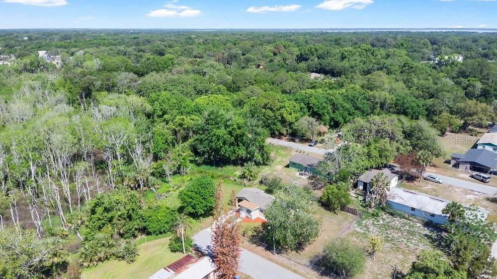 595 3rd Street Oviedo, FL 32765 - Photo 22 of 27 an aerial view of a house with a yard