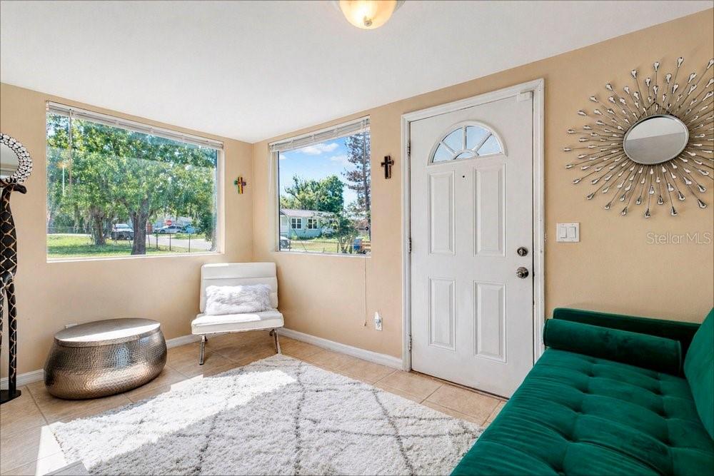 595 3rd Street Oviedo, FL 32765 - Photo 5 of 27 a living room with furniture and a large window