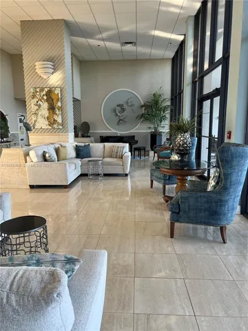 a view of a dining table and chairs in the patio