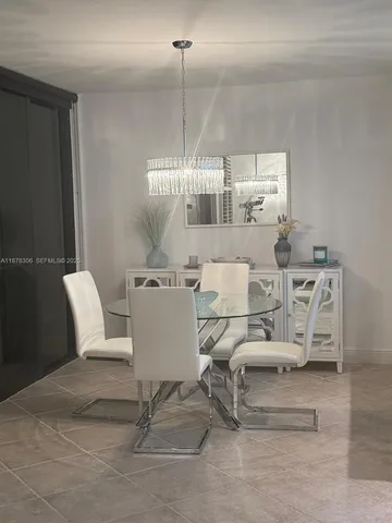 a kitchen sink sitting next to a window