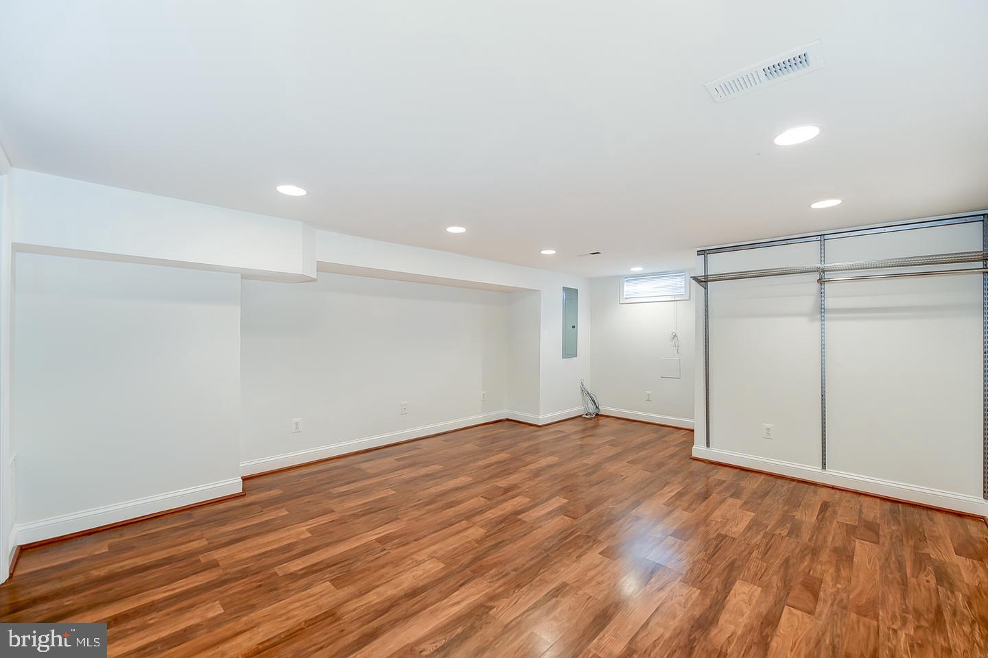 14 Florida Avenue Northeast Washington, DC 20002 - Photo 24 of 31 a view of an empty room with wooden floor