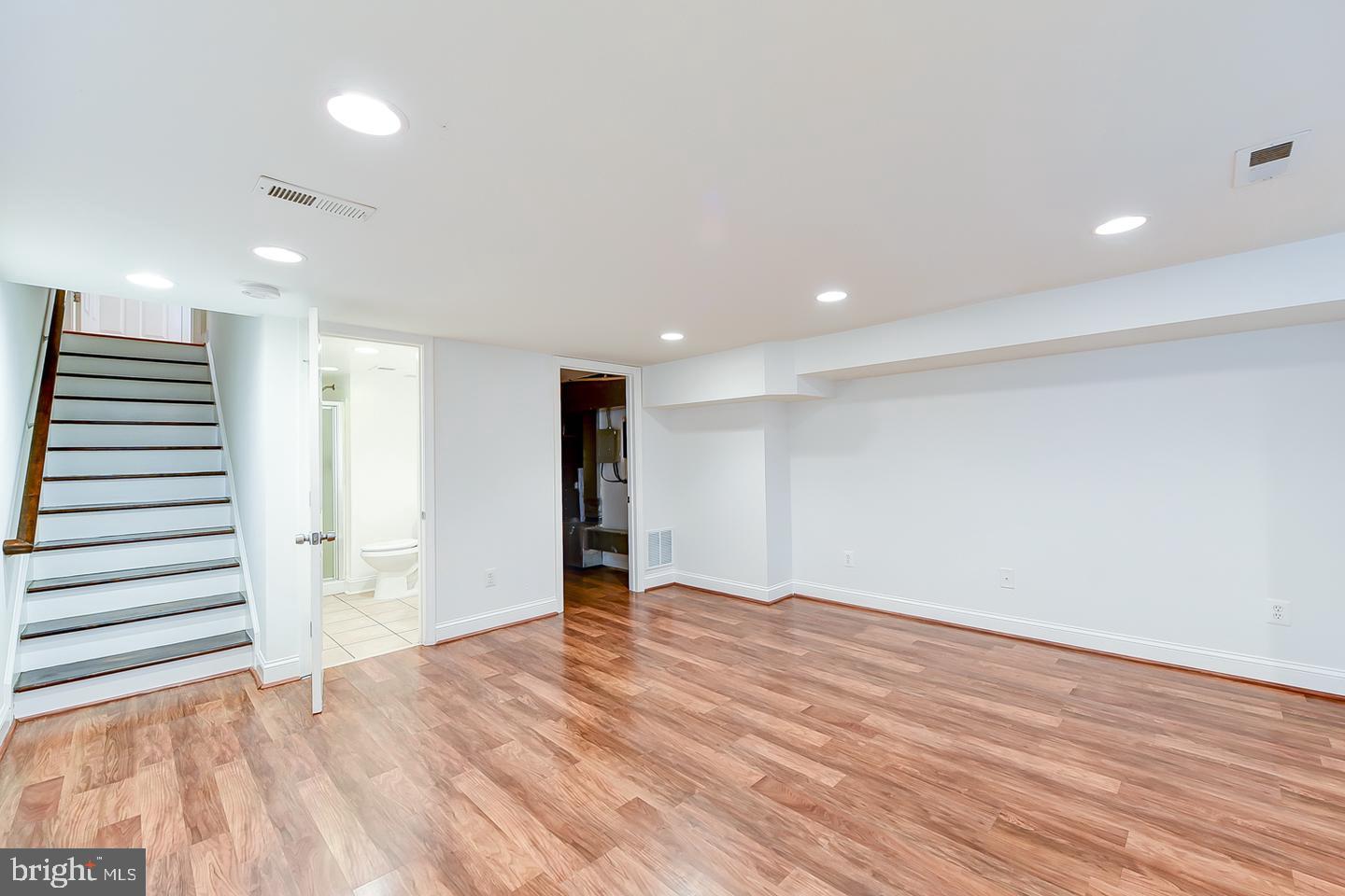 14 Florida Avenue Northeast Washington, DC 20002 - Photo 26 of 31 a view of an empty room with wooden floor and entryway