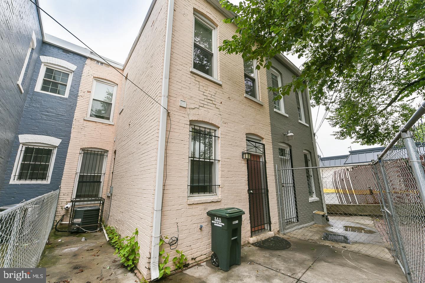 14 Florida Avenue Northeast Washington, DC 20002 - Photo 28 of 31 a view of a brick house with many windows