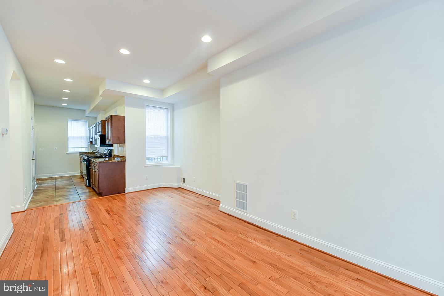 14 Florida Avenue Northeast Washington, DC 20002 - Photo 6 of 31 a view of a kitchen with wooden floor
