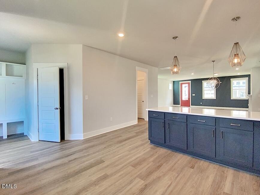 1309 Holding Village Way Wake Forest, NC 27587 - Photo 14 of 28 a view of kitchen and wooden floor