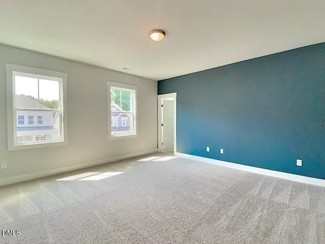 a bathroom with a toilet a sink and a shower