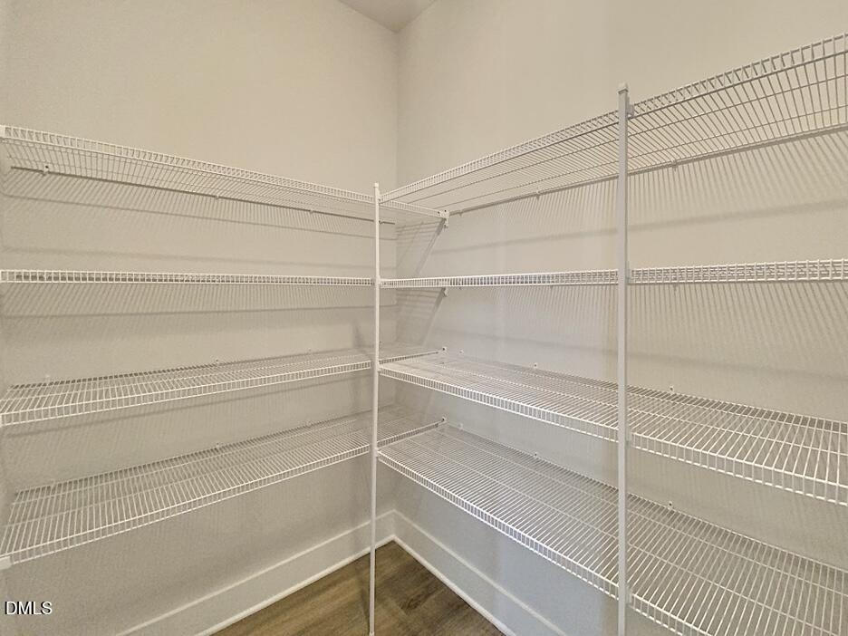 1309 Holding Village Way Wake Forest, NC 27587 - Photo 9 of 28 a view of a room with rack on the wall