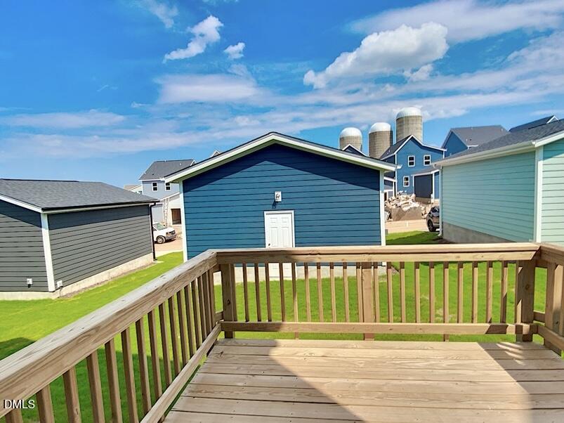 1309 Holding Village Way Wake Forest, NC 27587 - Photo 10 of 28 a view of a house with a balcony