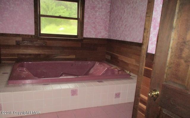 2817 Jackson Road Stroudsburg, PA 18360 - Photo 19 of 22 a bathroom with a sink and a window